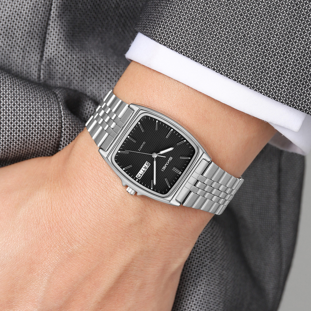 Momento de acero para hombres y mujeres reloj de cuarzo calendario domingo reloj de negocios comercio exterior spot transfronterizo fábrica de fuente personalizada