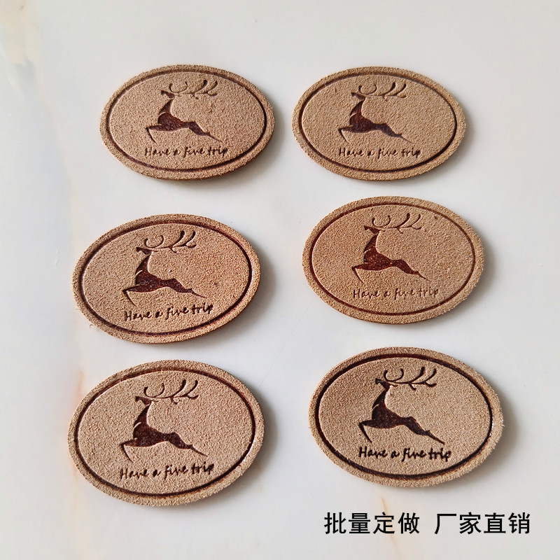 2025高品质真皮鞋帽辅料压印商标进口鹿皮材质时尚配饰供应商