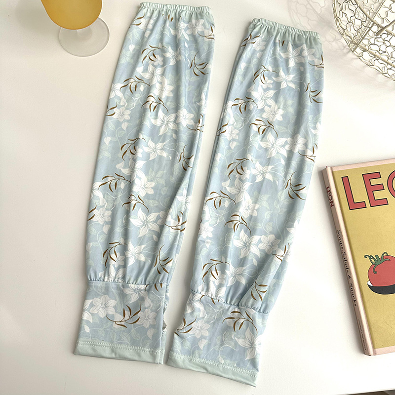 Mangas de protección solar para mujeres de verano nuevo estilo al aire libre anti-UV patrón de montar mangas de brazo de impresión de viento elegante