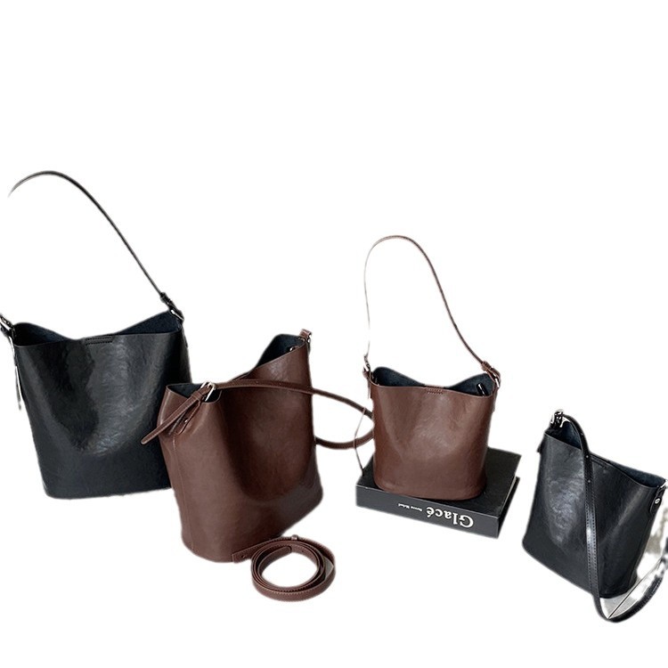 Bolsos de cubo de cuero de vaca vegetal 2024 nuevas tendencias retro bolsos de hombro único de moda bolso de mujer casual