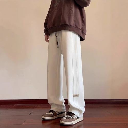 fashion brand casual pants men's loose spring and autumn new style drawstring sweatpants, young students 'high-end pants, trousers