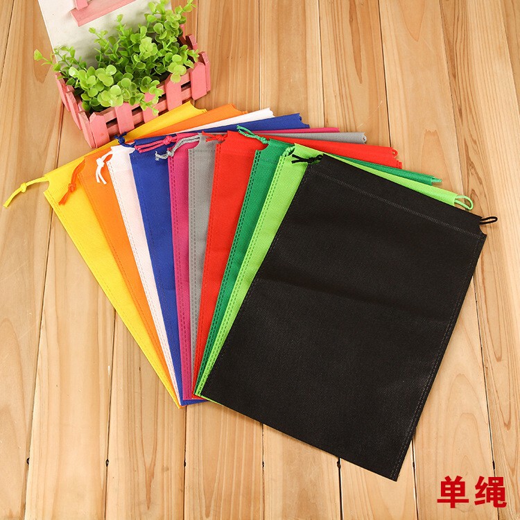 Non-woven fabric bundle pocket shoes clothing dustproof storage packaging bag toy drawstring bag in stock printed logo Non-woven fabric bundle pocket shoes clothing dustproof storage packaging bag toy drawstring bag in stock printed logo