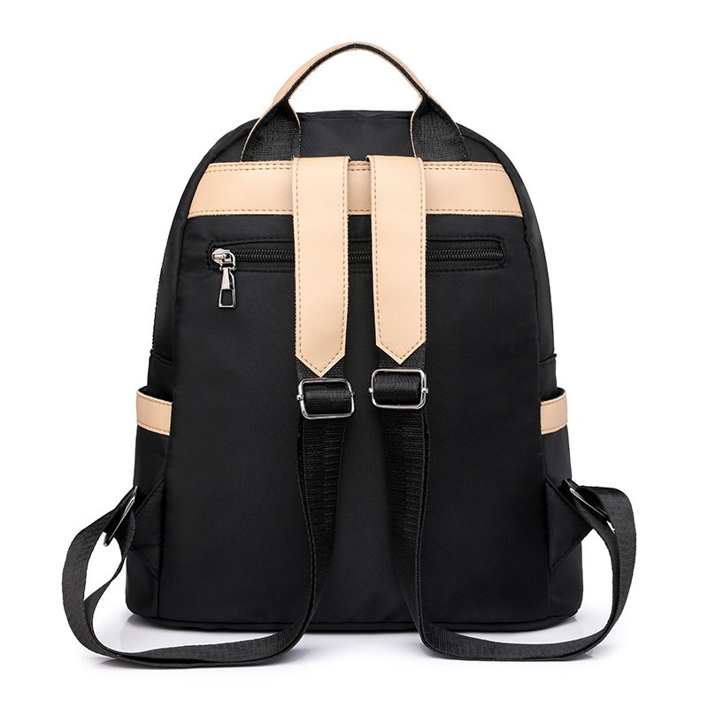 2024 verano nuevo estilo coreano damas mochila de nailon moda color contraste ligero mochila de viaje al aire libre al por mayor