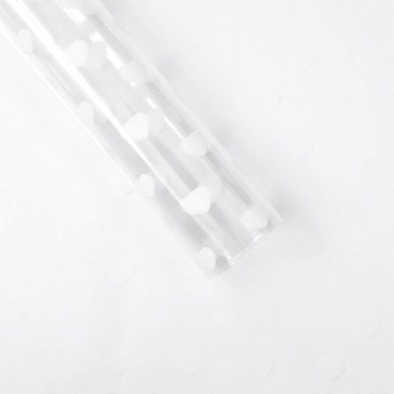 Fábrica de fiestas de flores al por mayor nuevos productos de impresión de amor de papel de vidrio flor de embalaje de flores transparente florista embalaje de papel