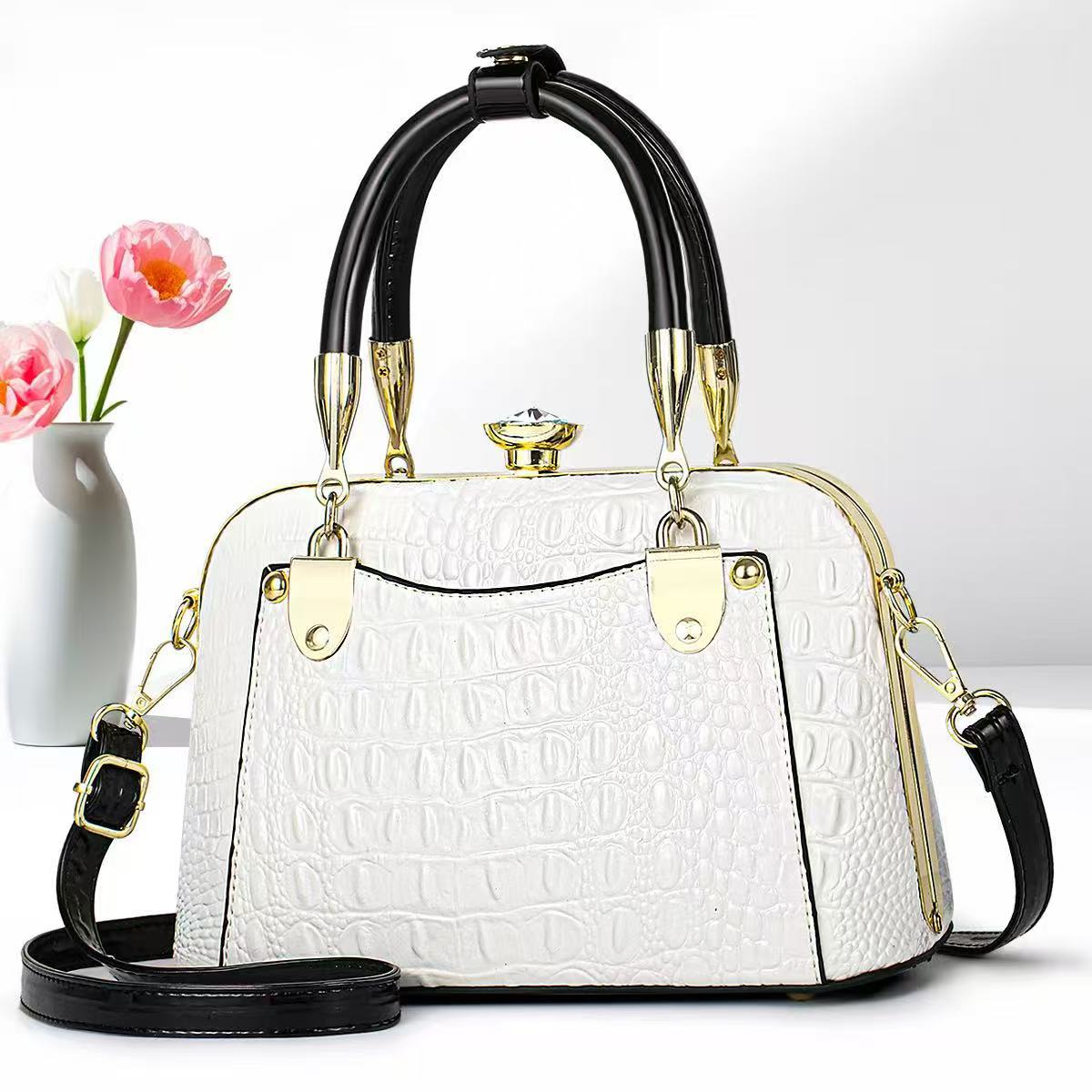 Bolsos de mujer verano nuevo estilo bolso de madre bolso de hombro de mediana edad bolso de mensajero de nicho de regalo de todo fósforo