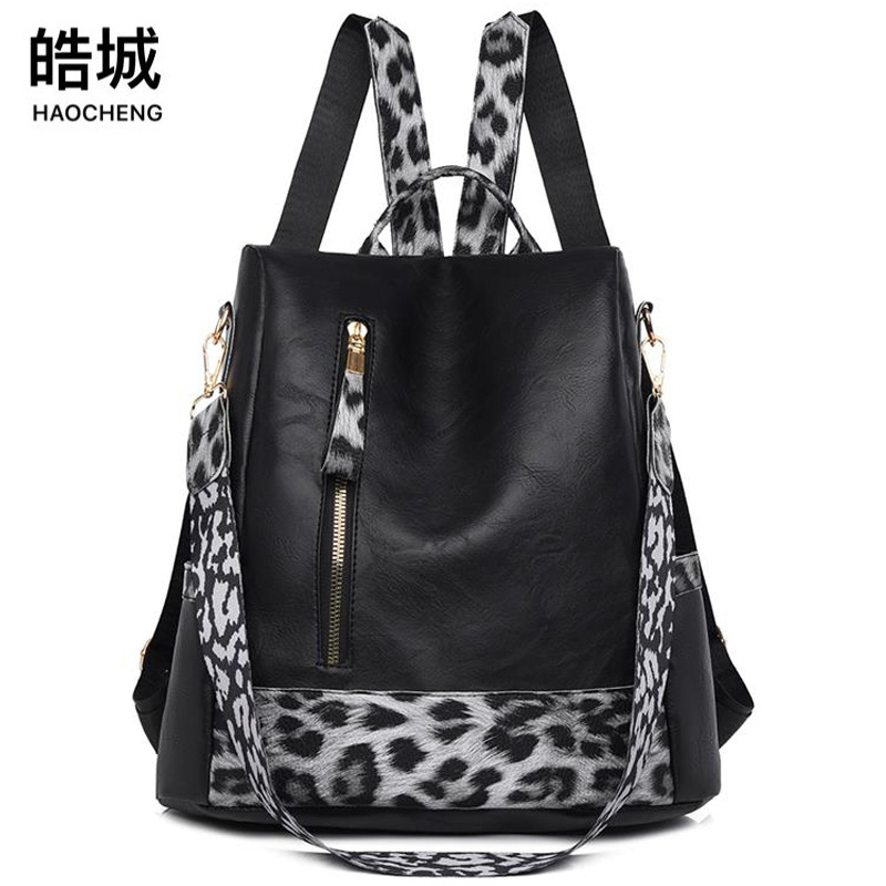 Fabricantes al por mayor 2025 nueva mochila de cuero suave para damas retro europeas y americanas moda estampado de leopardo contraste color bolso de mochila antirrobo