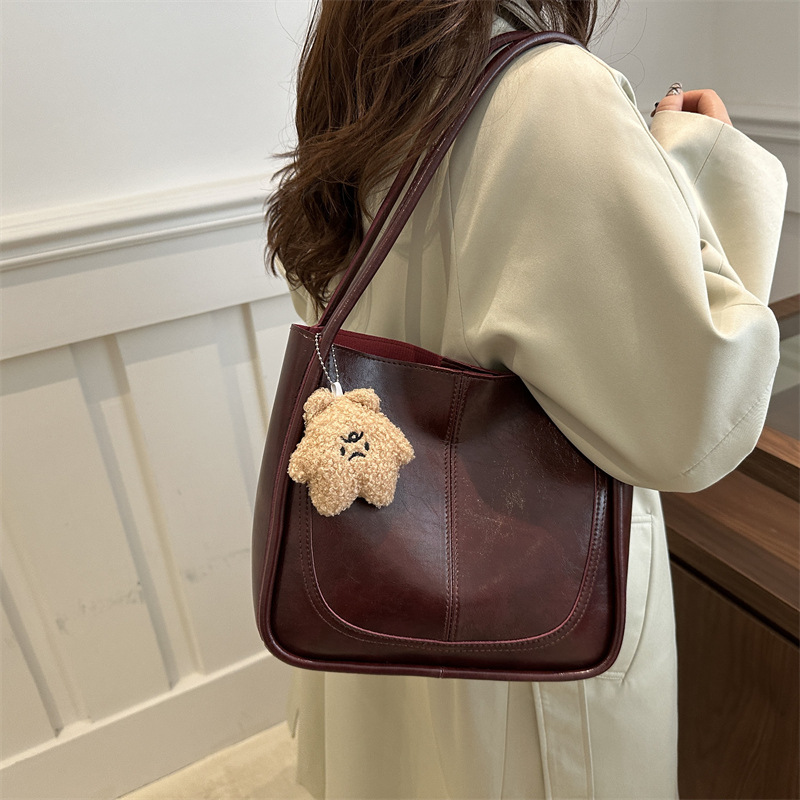 Bolsos populares para mujer 2024 otoño e invierno nuevo estilo coreano retro de gran capacidad para viajar en clase bolso de hombro bolso de moda