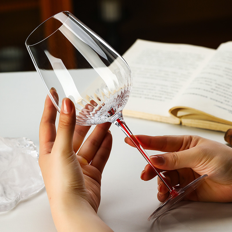 Luz de lujo de alto grado de color tazas de vino tinto de cristal de alta calidad tazas de alto pie comerciales tazas de vino de alto valor