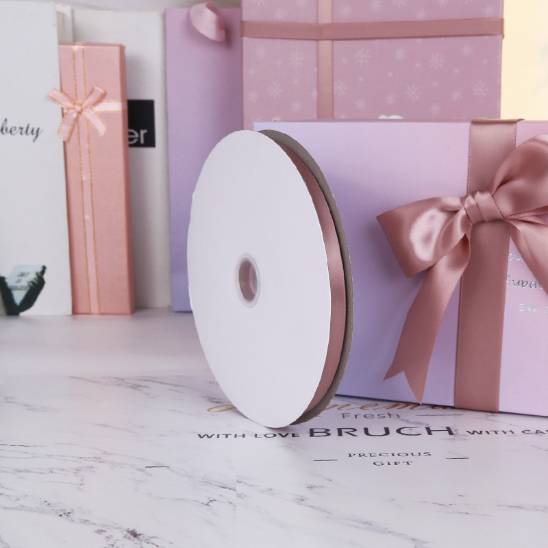 Un solo lado de poliéster cifrado cinta de boda festiva embalaje cinta accesorios de ropa 161 lotus polvo cinta de color fábrica al por mayor