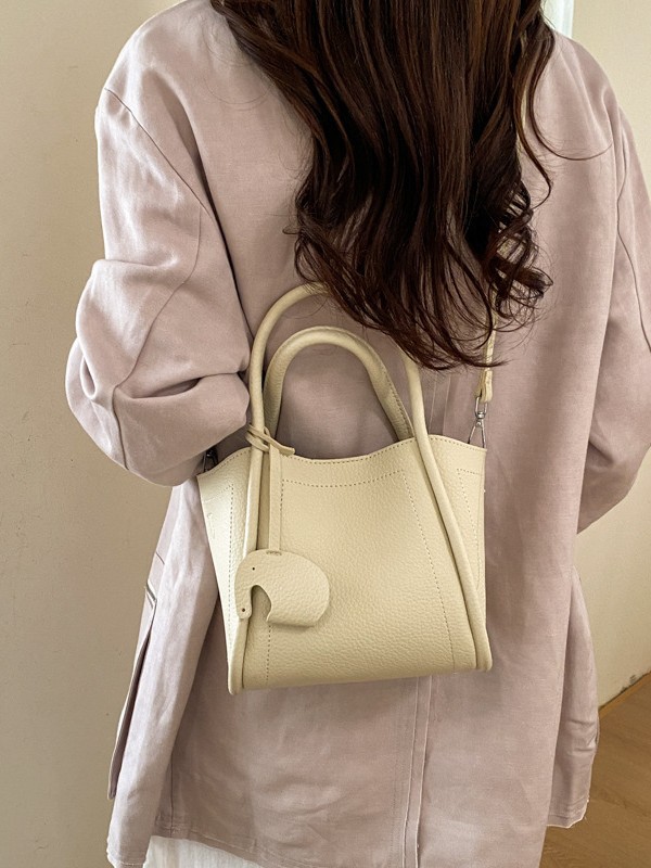 Bolso para mujeres 2026 nuevo estilo de moda bolso de cubo portátil de alta calidad lichi patrón popular lujo ligero mochila casual