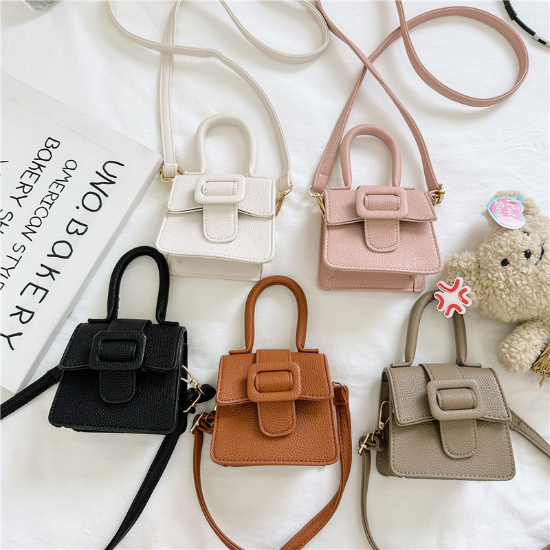 Bolsa para niños Otoño e Invierno Nueva moda europea y americana patrón de lychee mini bolsa de sillín retro hebilla de herradura bolso de las niñas