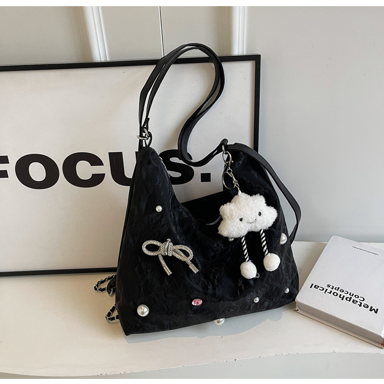 Bolsa de gran capacidad para mujeres 2024 nuevo nicho de alto nivel de diseño de diamantes de viaje multifuncional mochila de doble hombro inclinada