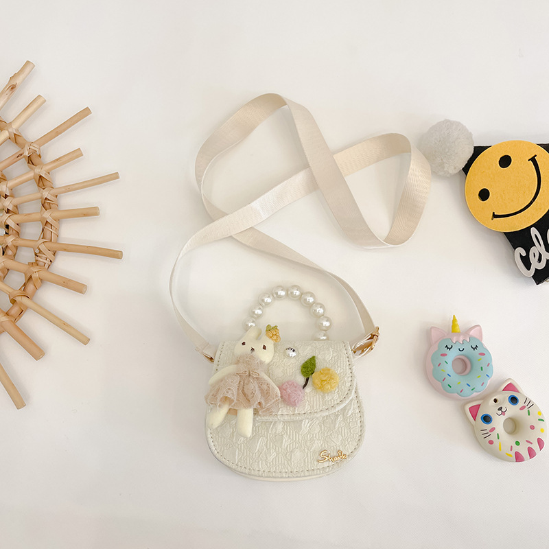 Bolso de los niños otoño e invierno nuevo lindo conejo perla bolso de mano chica princesa encaje bolsa de mensajero monedero comercio exterior