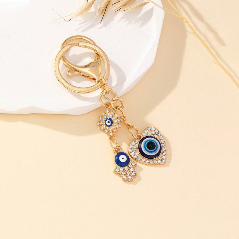 Cross-Border Hot Sale New Heart-Shaped Palm Water Drop Evil Eye Pendant Accessories Keychain Key Ring Manufacturer_voghion.com