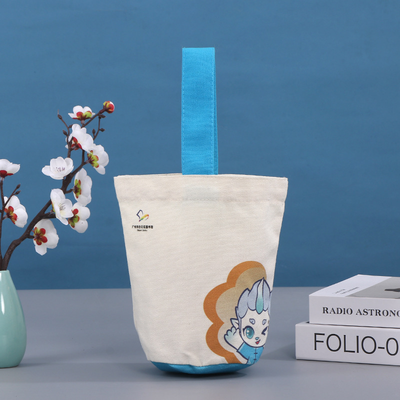 女士单根水桶包帆布袋外出拍照收纳包印花单根手提帆布小布袋子