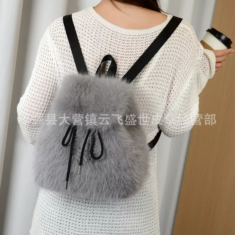 2025新款仿狐狸毛双肩包女大学生休闲抽绳翻盖磁扣大容量包包女