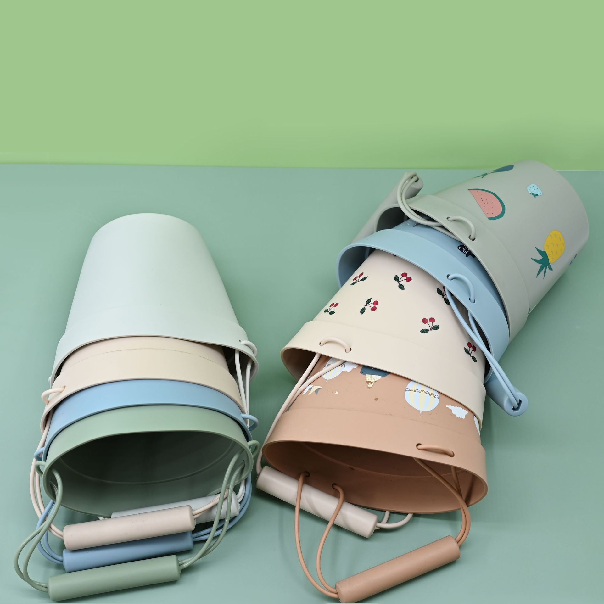 Juguetes de barriles de playa transfronterizos al por mayor parques infantiles de silicona barriles de agua bebé jugando con arena herramientas de pesca