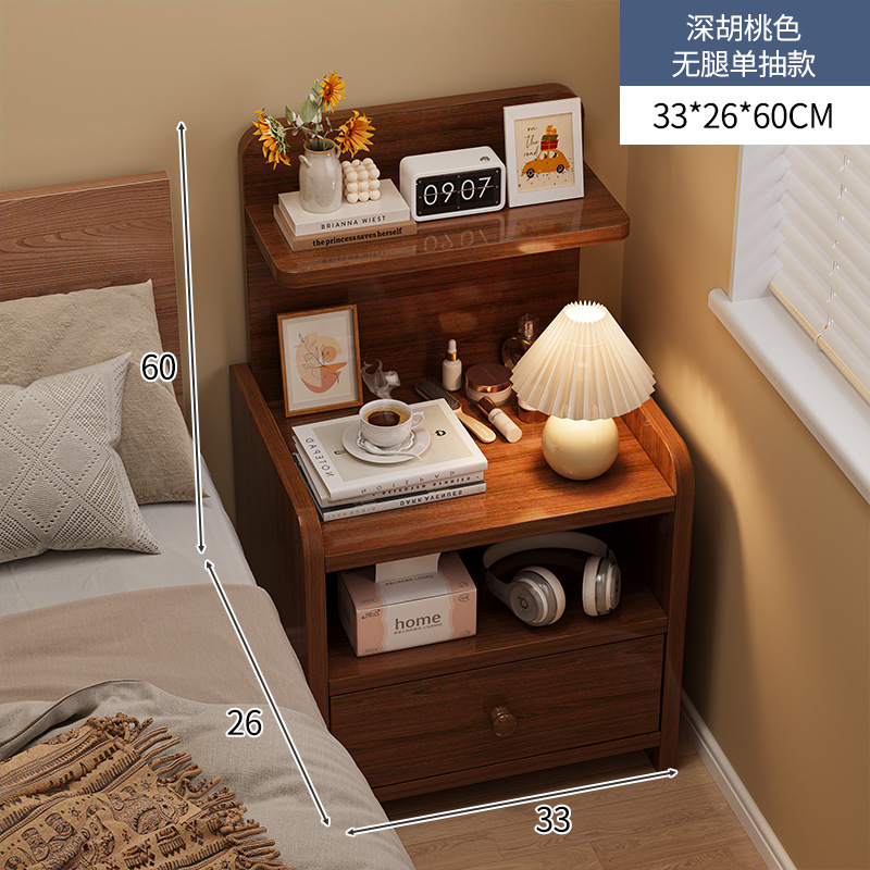 Mesilla de noche simple y moderno armario de almacenamiento de pierna de madera maciza pequeño dormitorio simple hogar 2025 nuevo estante de cabecera