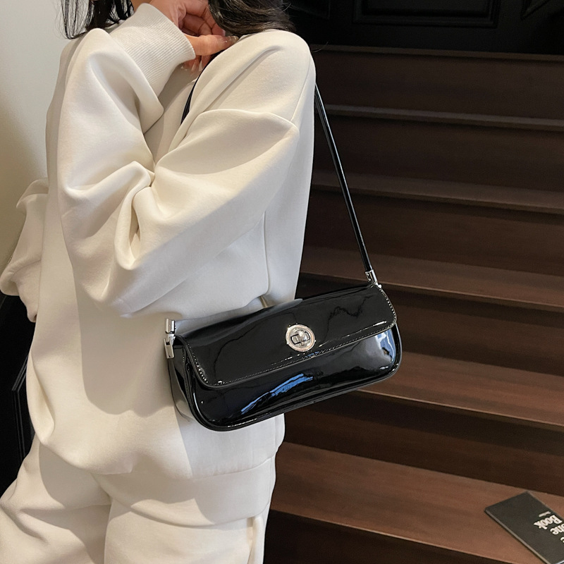 Bolso de axila de textura de alta calidad 2025 primavera nuevo bolso femenino charol brillante bolso de hombro fresco simple