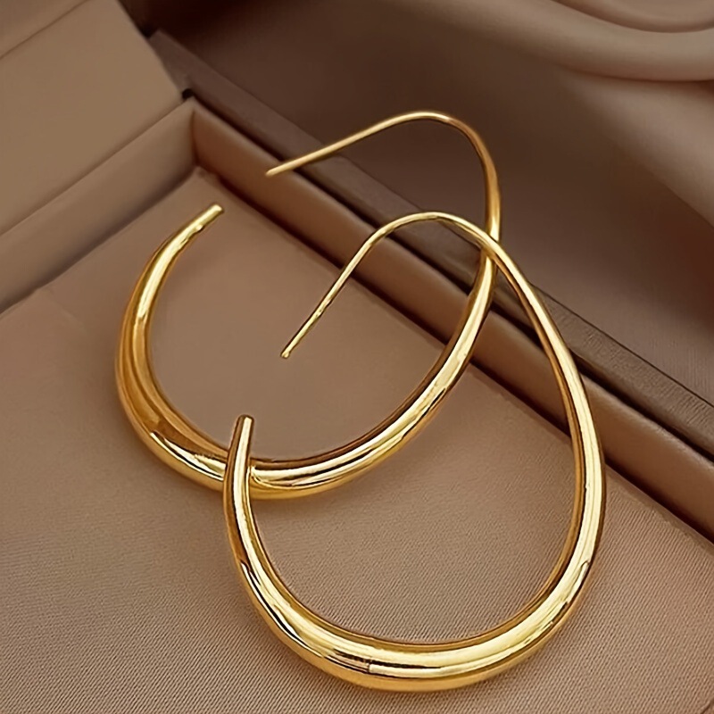 Europe and the United States cross-border hot selling simple temperament U-shaped oval copper earrings ladies personality retro high-end feeling ear ring wholesale