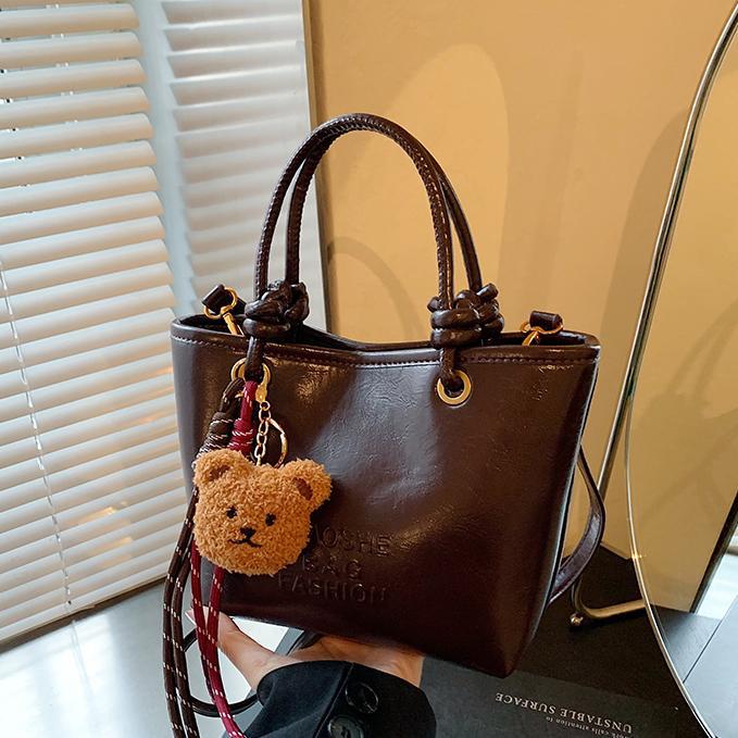 Bolsos de balde casuales retro de mano para mujeres otoño y invierno 2024 nueva moda moda bolso de hombro de alta calidad bolso de nicho de mujer