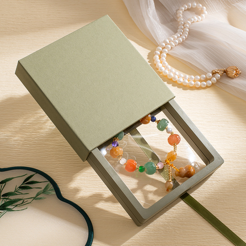 Caja interior verde oscuro + verde; 9cm * 9cm * 2cm (medio)