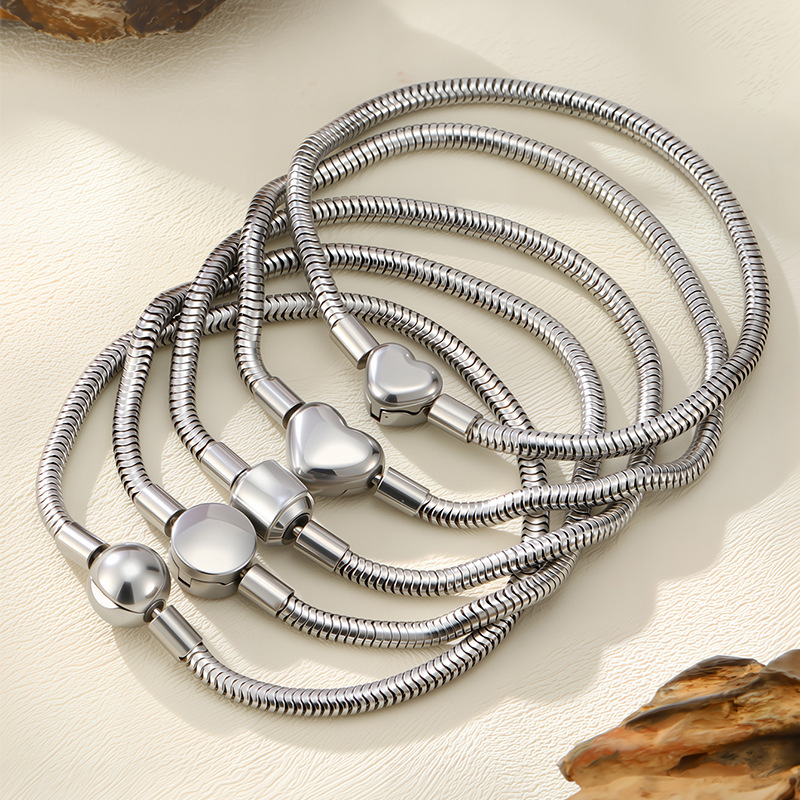 New Titanium Steel Bracelet Round Snake Heart-Shaped Bead Pendant Bracelet Women's Niche Light Luxury High-End Cross-Border Hot-Selling Bracelet
