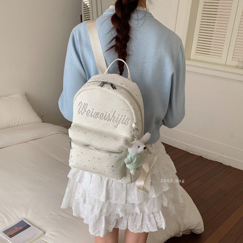 Mochila de moda mochila 2026 mochila de gran capacidad para estudiantes universitarios en clase nueva primavera bolsa de letras lienzo para mujeres