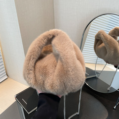 新しいぬいぐるみのハンドバッグの女性のかわいい肉まんの形はミンクの毛の秋冬の百合の淑女の斜めのショルダーバッグの手をまねて毛羽立ちをします。