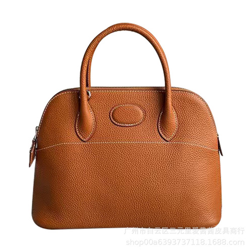 New Arrival Litchi-Grain Genuine Leather Bowling Ball Shell Bag  
Premium Full-Grain Cowhide Tote with Zipper Closure  
Spacious Casual Women's Handbag