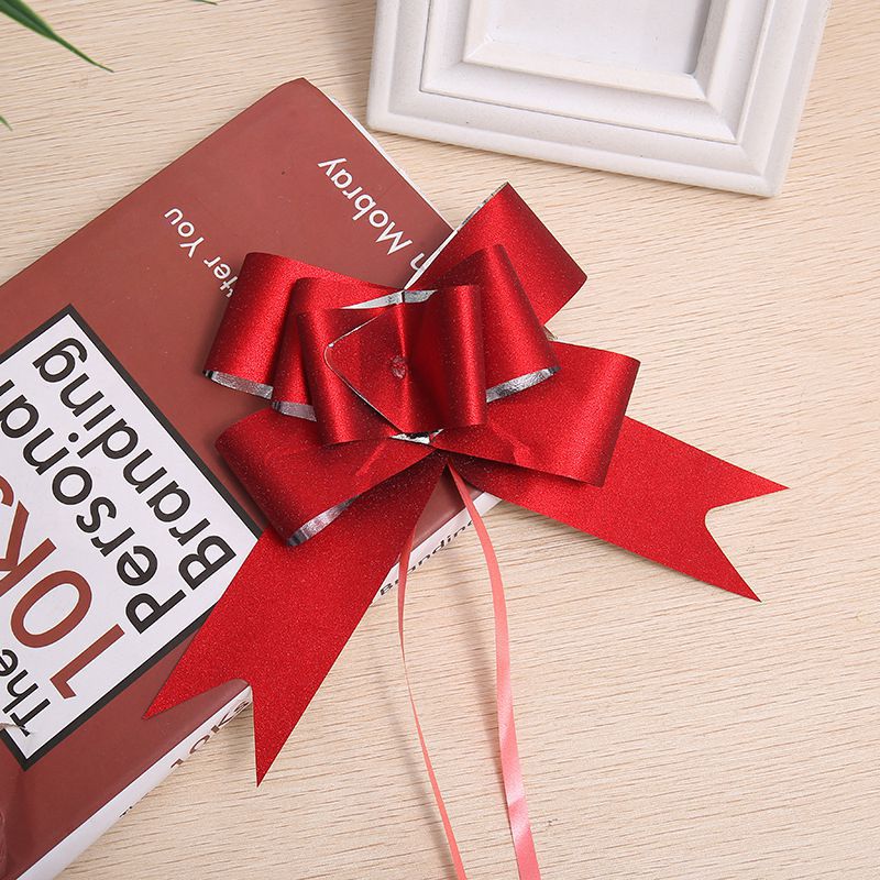 Cruz-frontera Venta caliente de alta gama de decoración del hogar de regalo de la flor embalaje arco mano tirar flor 50 cebolla colorida boda coche puerta tirar flor