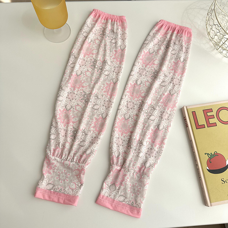 Mangas de protección solar para mujeres de verano nuevo estilo al aire libre anti-UV patrón de montar mangas de brazo de impresión de viento elegante