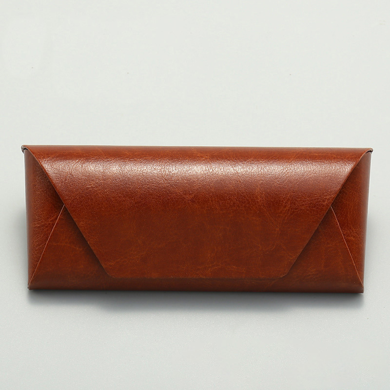 Caja de gafas de absorción magnética de alta calidad portátil para gafas de sol resistente a la compresión y anti-caída corteza miopía bolsa de colocación