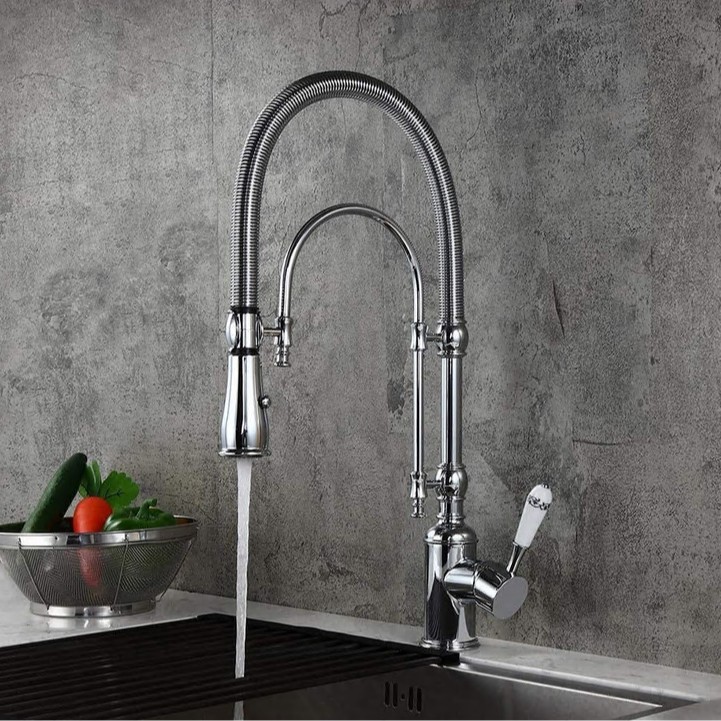 Suministro transfronterizo hogar tire primavera grifo cepillado oro caliente y fría de doble uso multi-funcional grifo de la cocina al por mayor
