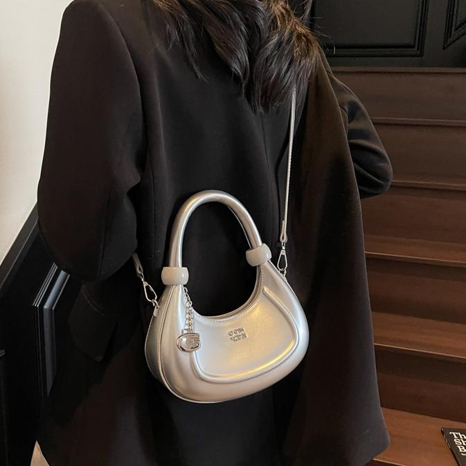 Bolsos de diseño de nicho de tendencia transfronteriza para mujer 2025 nuevo bolso de hombro retro salvaje bolso de axila de moda occidental
