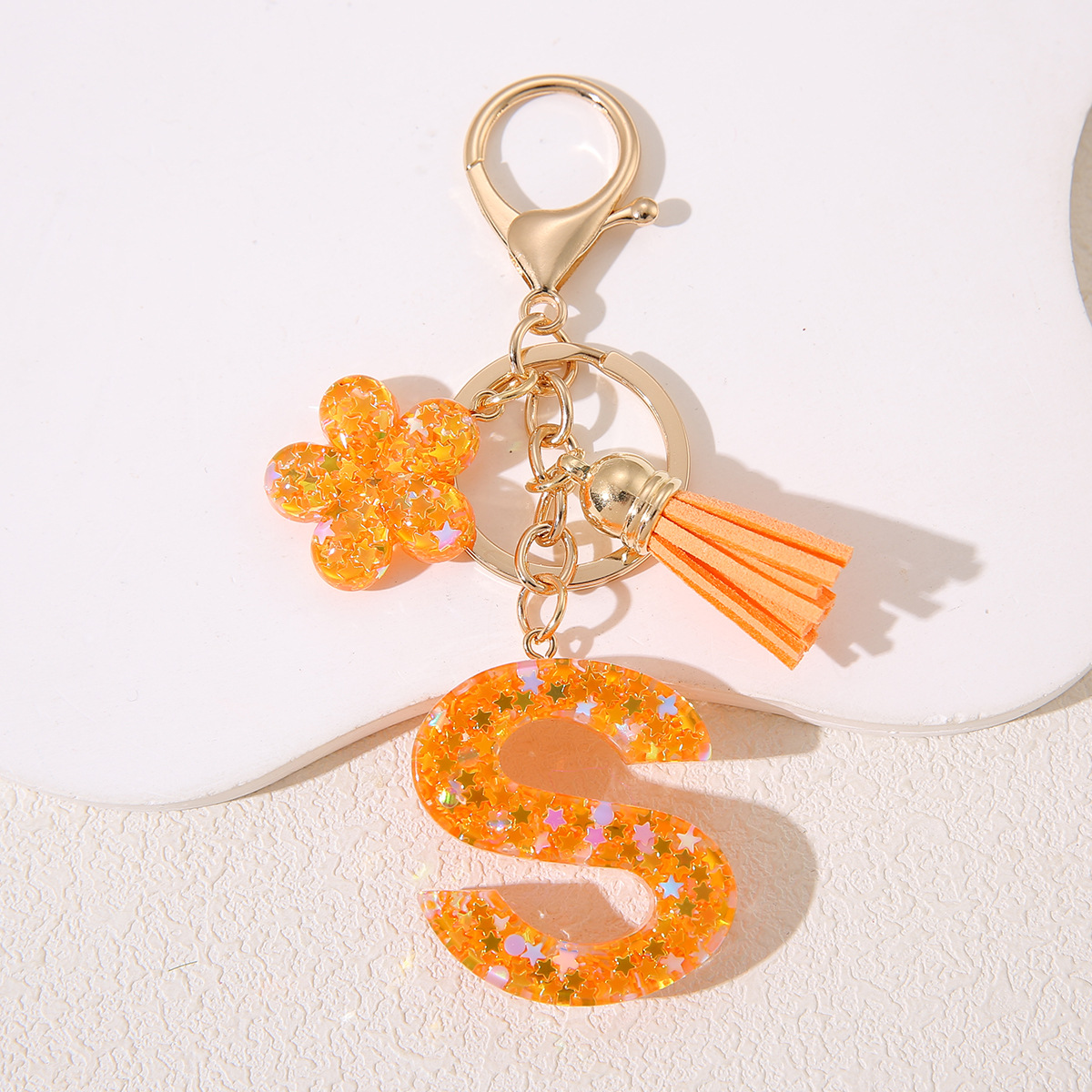 Mayorista Amazon Stanley Cup Chain Keychain Joyería de goteo de gel sequilla flores letras de estrellas llavero mujer