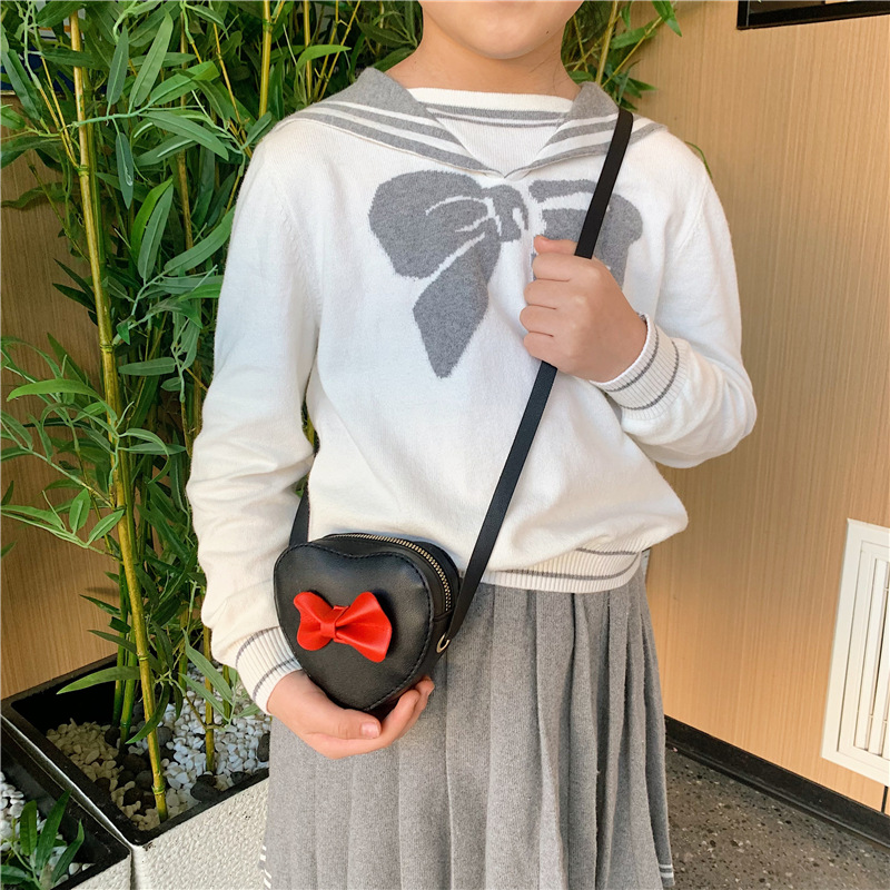 Dulce amor modelado niña pequeña bolso de hombro de dibujos animados arco bebé mochila 2026 nuevo bolso para niños