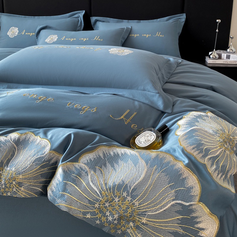 Nuevo traje de cuatro piezas con bordado de seda lavado, sábana de viento de lujo ligero, color sólido, sábana simple, funda de edredón al por mayor