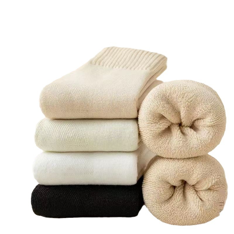 Pareja de invierno forrada de lana engrosada a prueba de frío Toalla de mujer caliente inferior Terry calcetines Zhuji suministro de fábrica al por mayor calcetines de hombre