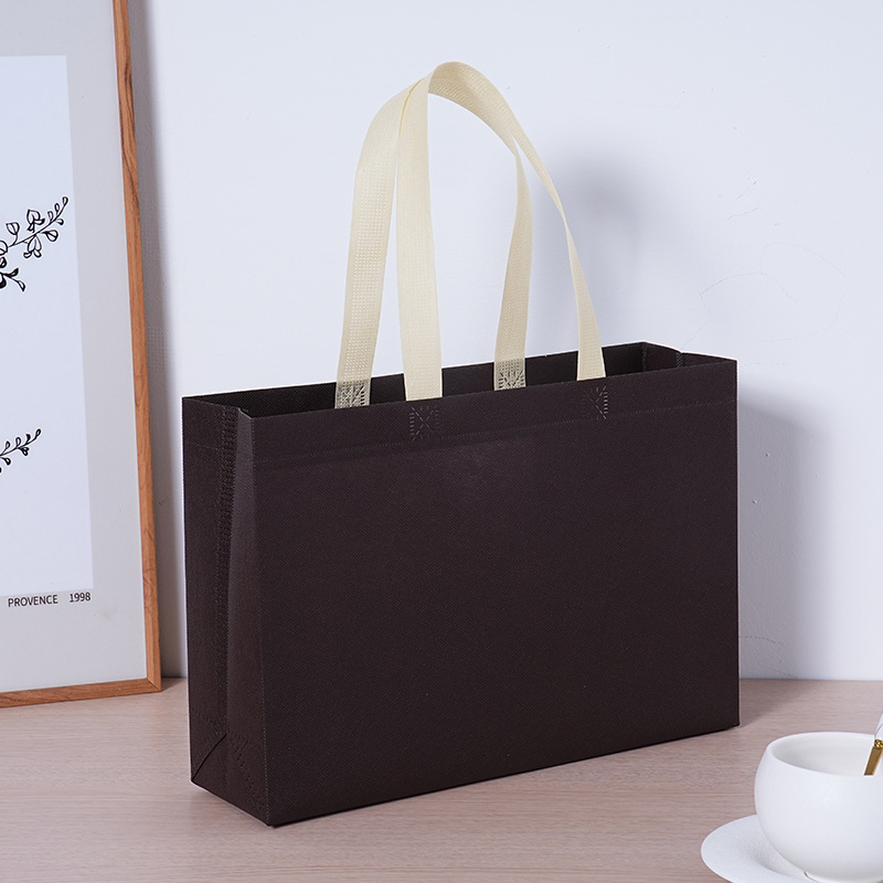 Bolsas de tela no tejida personalizadas logotipo bolsas de compras portátiles bolsas de ropa al por mayor de alta calidad tiendas de ropa de mujer bolsas personalizadas
