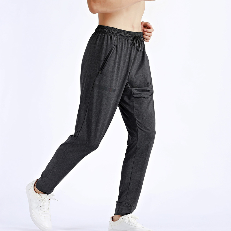 Men's sports trousers autumn and winter outdoor fitness running quick-drying light breathable leisure slim spot wholesale UA