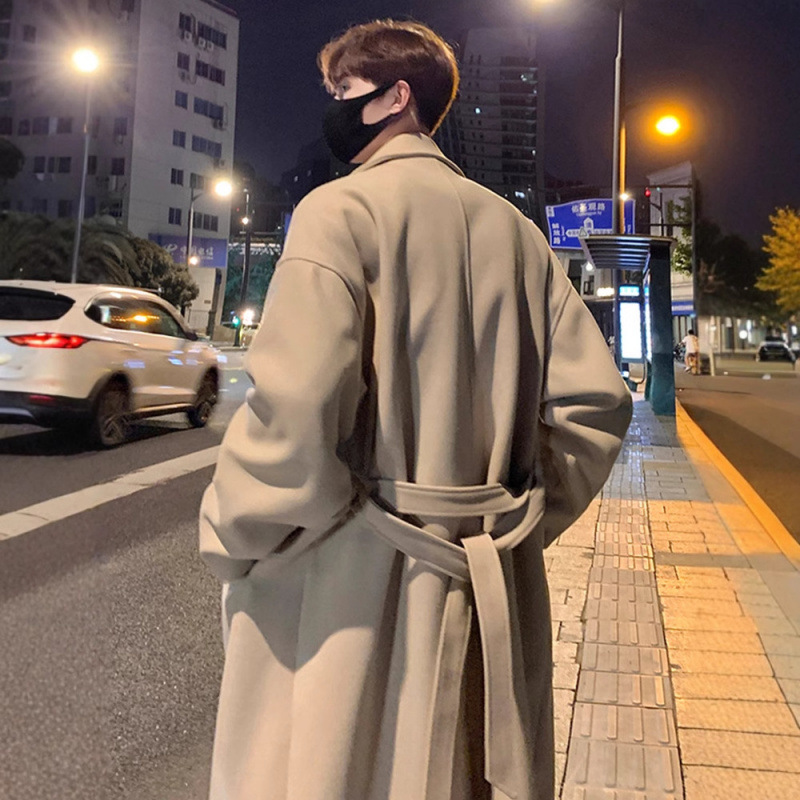 韓国版百合の中長のウインドブレーカーの男性の秋冬のタイプは膝の英倫の風毛のコートを過ぎてゆったりとしています。