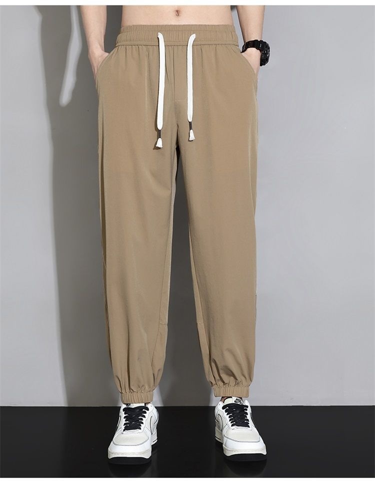 Quần jogger nam bo gấu dài ống bó, chất liệu băng lụa mỏng mùa hè, form rộng thùng thình, phong cách thể thao, nhiều size từ M đến 8XL — màu đen, màu xám đậm, màu kaki chi tiết 17