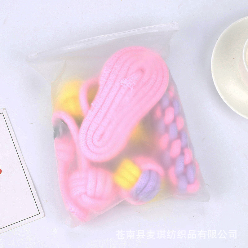 Suministros populares de juguetes para mascotas japoneses y coreanos, juego de juguetes duraderos para perros resistentes a las mordidas, juguete de pelota con nudo de cuerda para cachorros.