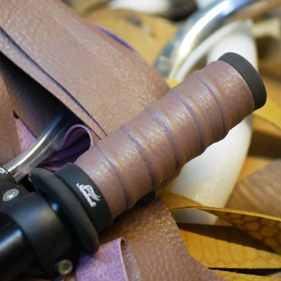 Motorcycle Handle Cover – Harley Motorcycle Electric Throttle Wrap - smoked-purple-bull-leather-with-a-pair-of-bones