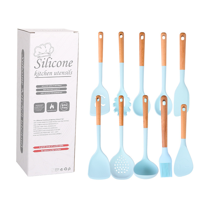 Suministros de cocina Mango de madera de silicona sartén antiadherente europea Espátula de silicona Juego de 10 piezas Juego de utensilios de cocina azul resistente a altas temperaturas