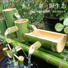 竹の水の循環の石の溝の水槽の家庭用の屋外の庭の置物は噴水の風水の輪を飾って酸素を増加して加湿します。