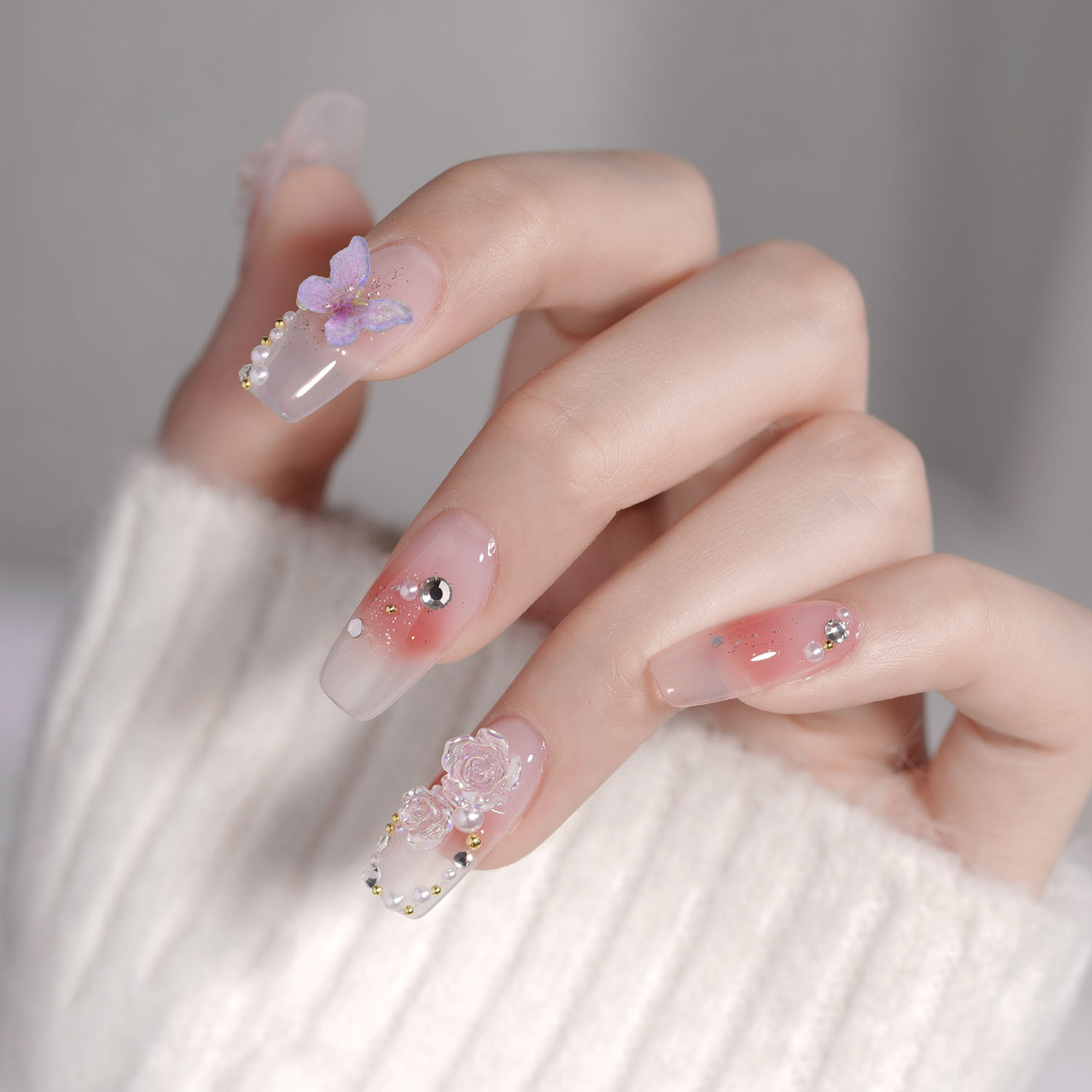 2023 nuevos accesorios de manicura camellia material paquete cadena de mariposa rosa arco mezcla combinación