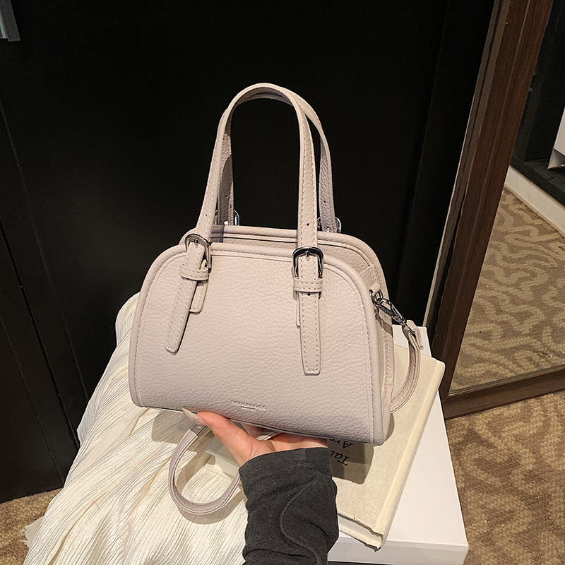 Bolsos populares de este año 2025 primavera y verano nuevo bolso femenino casual con patrón de lichi bolso de hombro simple bolso de mensajero de viaje