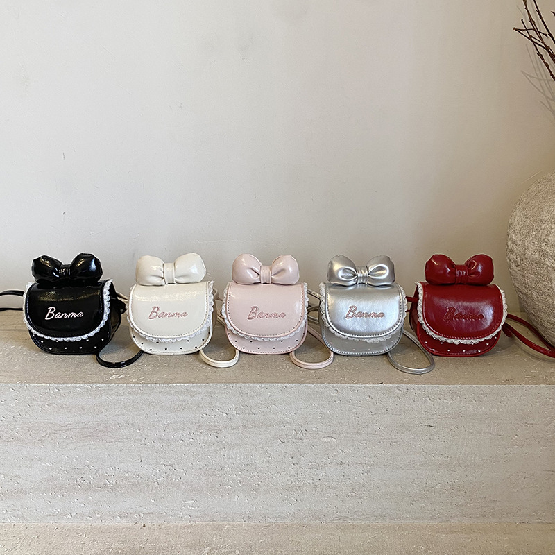 Nuevos accesorios para niños dulces lindos bolsos de hombro princesa arco ondulado punto de micro bolso de bebé